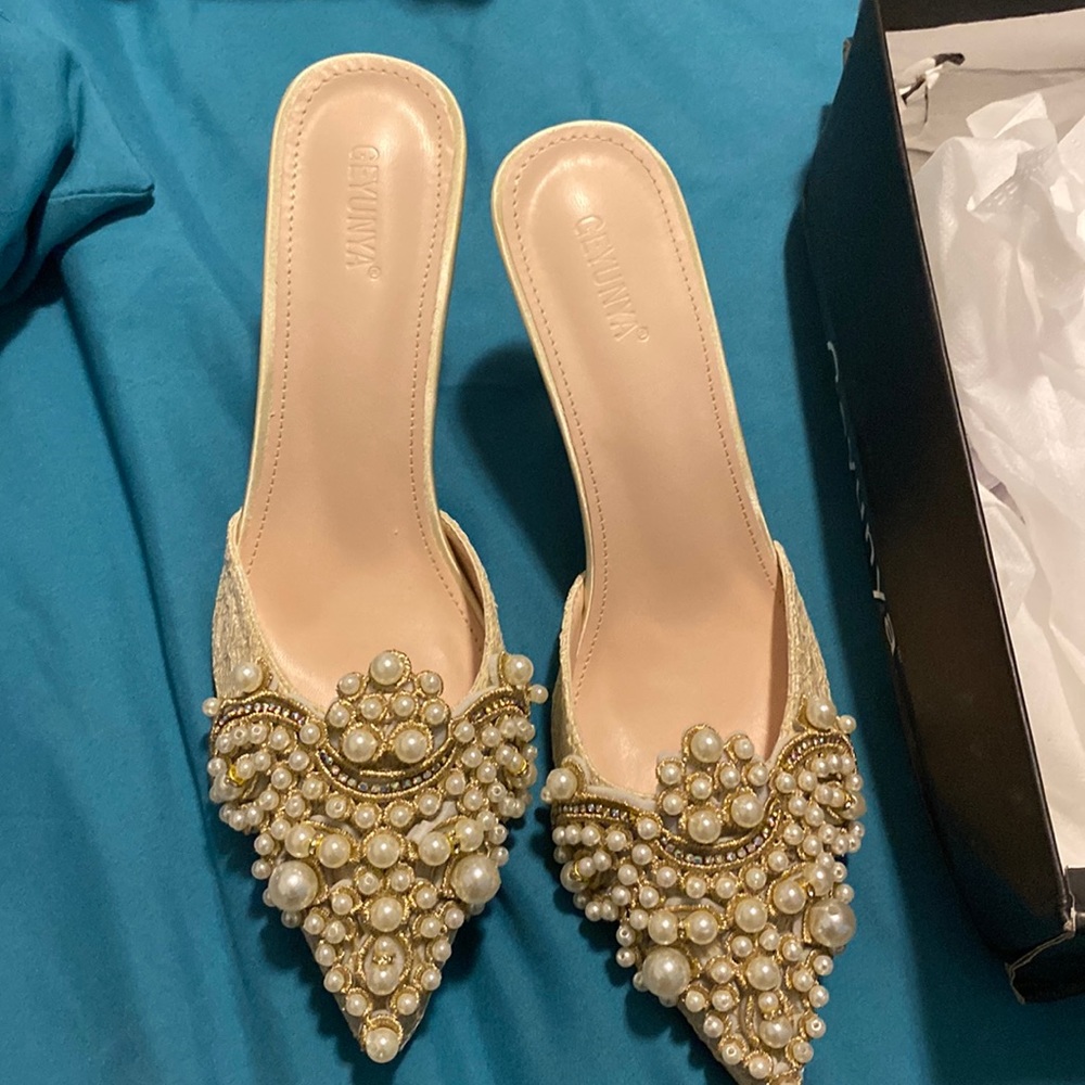 Pearl slip on heels c cream color, never worn , still have box
